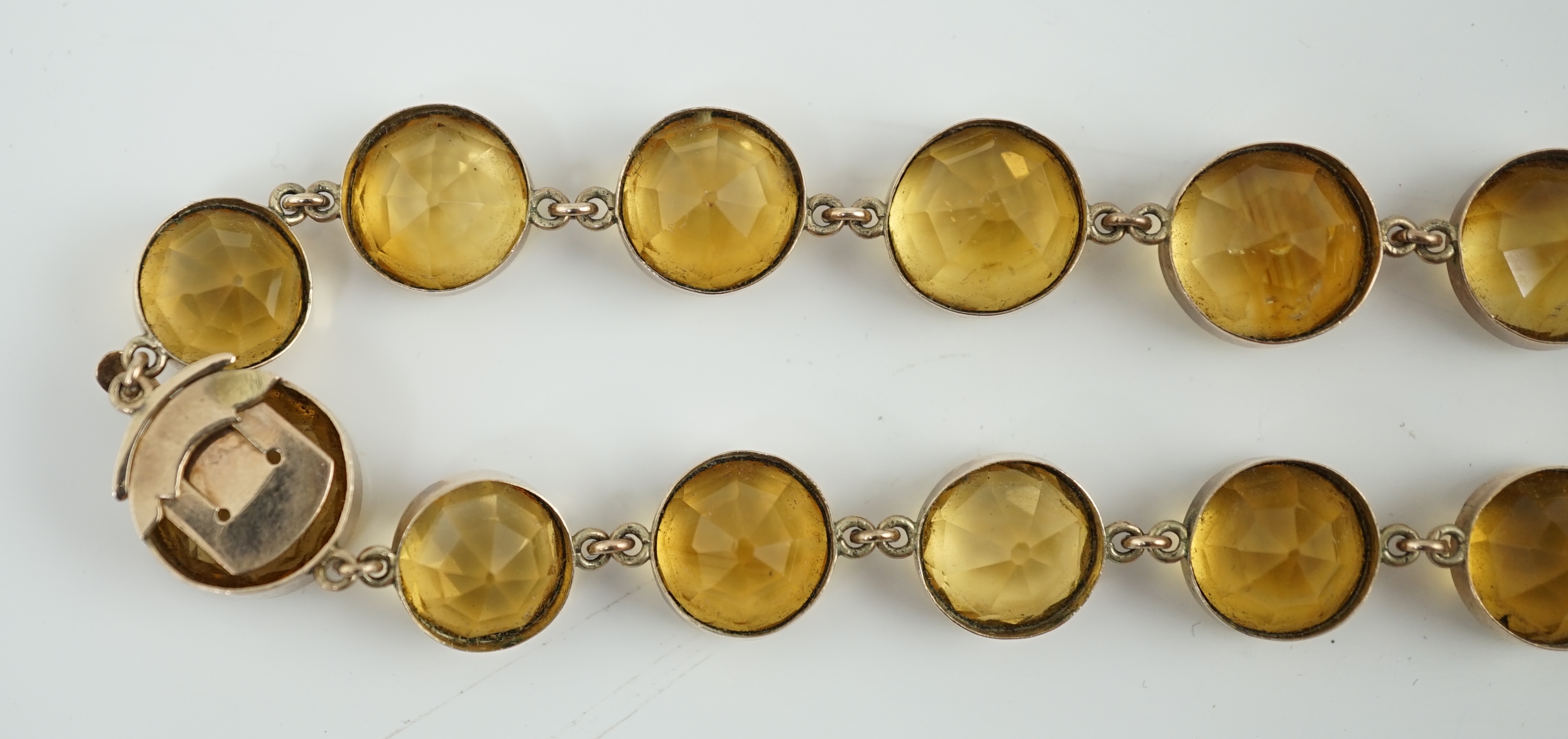 An early 19th century gold and citrine riviere necklace